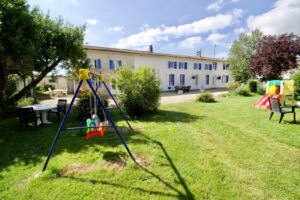 Gite complex with swing set